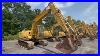 1998-John-Deere-110-Hydraulic-Excavator-Bidassure-Guarantee-01-lm