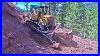 Caterpillar-D7g-Bulldozer-Makes-Road-By-Removing-Giant-Blocks-Of-Rock-Caterpillar-Bulldozer-01-xgw