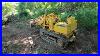 Clearing-Land-With-A-John-Deere-350b-Loader-01-vyze