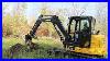 Deere-60g-Excavator-Fueling-Up-U0026-Knocking-Trees-Over-01-rkmk