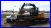 John-Deere-75d-Excavator-Loading-Clay-Into-Single-Axle-01-clz