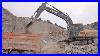 John-Deere-E260lc-Excavator-Loading-Dumptruck-In-Quarry-Excavator-Operation-Digger-01-bz