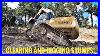 John-Deere-Excavator-Digging-Stumps-And-Clearing-Brush-01-esd