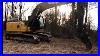 New-Rake-On-The-Excavator-And-Some-Broken-Glass-01-hzbv